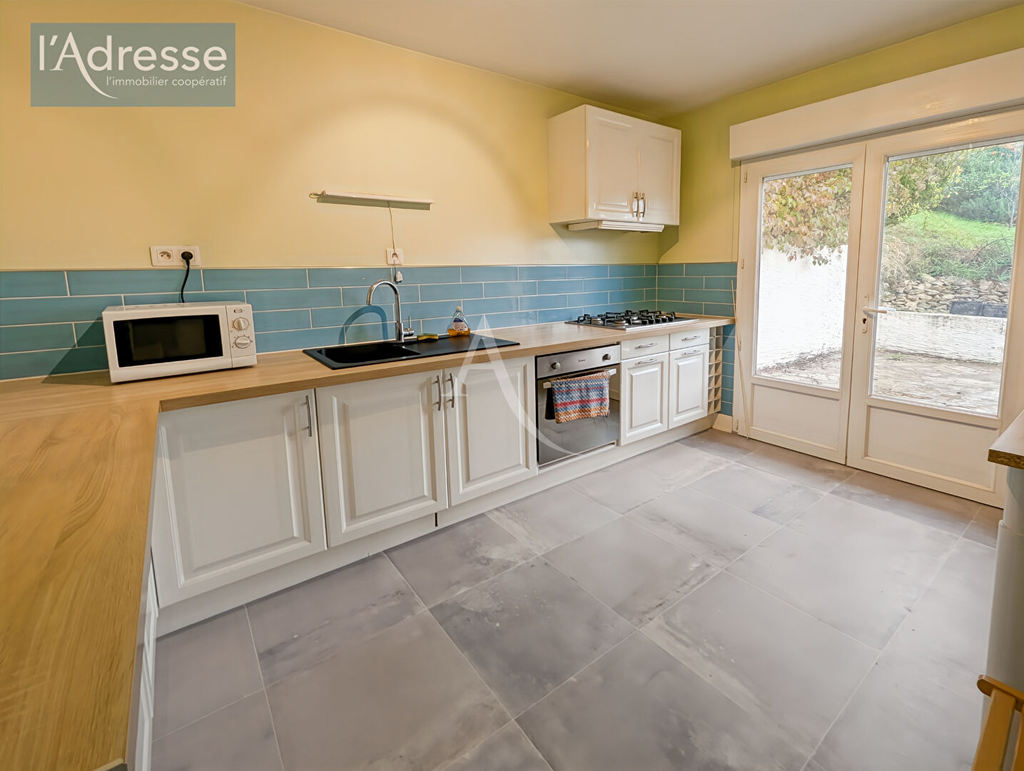 Photo Maison avec 2 appartements indépendants et garage - Puy-l'Évêque, proche commodités image 3/6