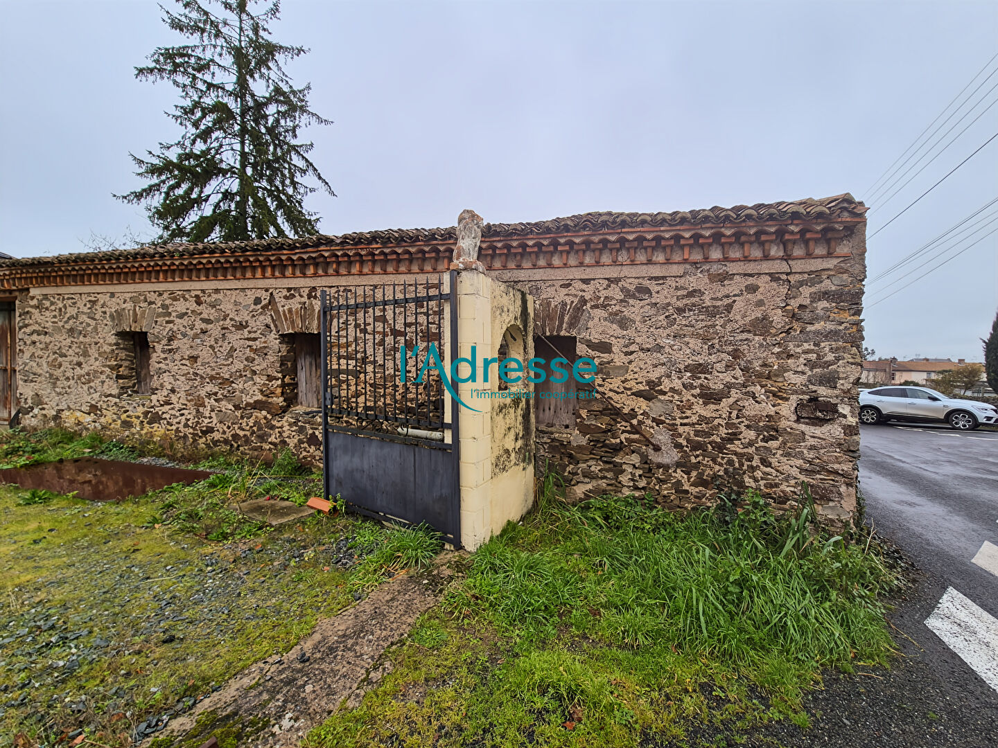 Photo Garage en pierres de 60 m² image 2/4