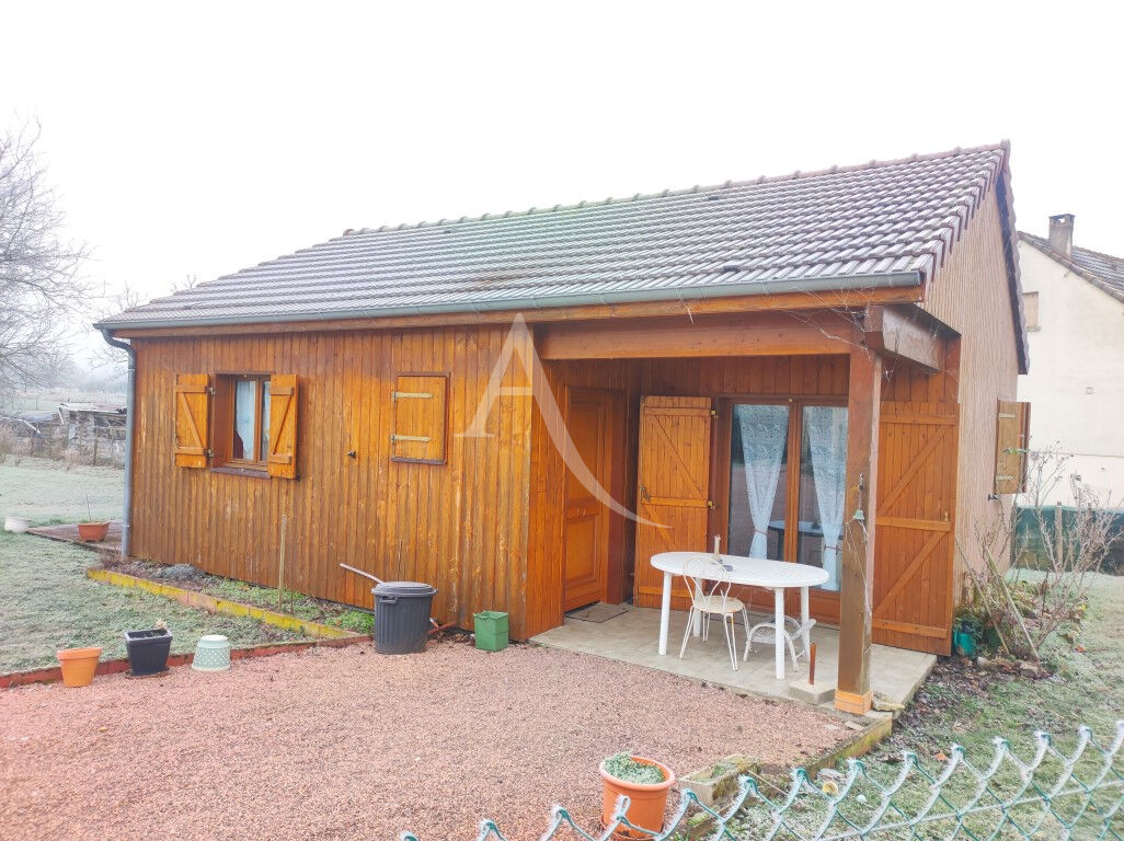 Photo A VENDRE -ST PIERRE LE  MOUTIER  Maison style chalet image 5/6