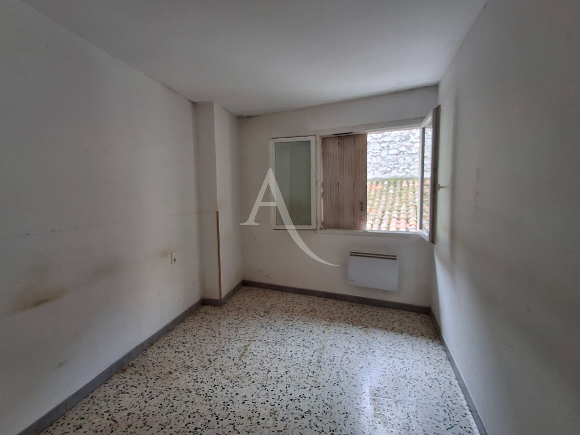 Photo BEDARIEUX Immeuble de deux appartements avec garage image 2/6