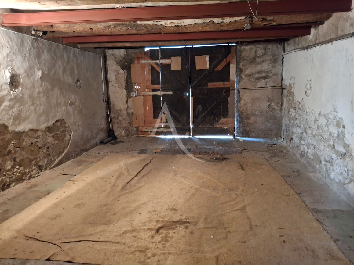 Photo BEDARIEUX Immeuble de deux appartements avec garage image 4/6