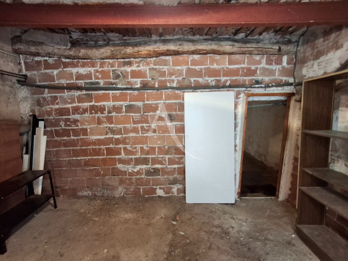 Photo BEDARIEUX Immeuble de deux appartements avec garage image 5/6