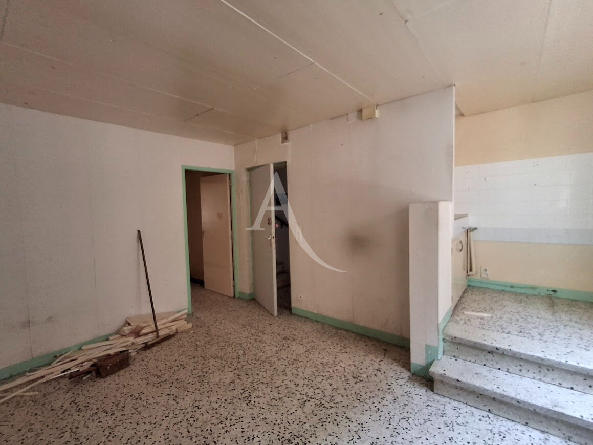 Photo BEDARIEUX Immeuble de deux appartements avec garage image 6/6