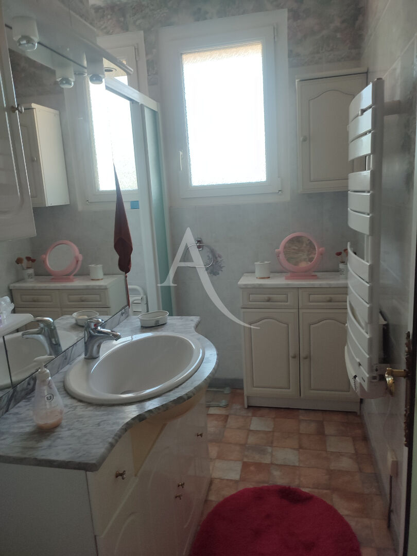 Photo Maison dans quartier calme proche commerces. image 4/6