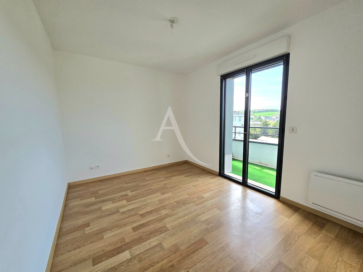 Photo Appartement 3 pièce(s) 53.10 m2 avec balcons et parking image 4/5