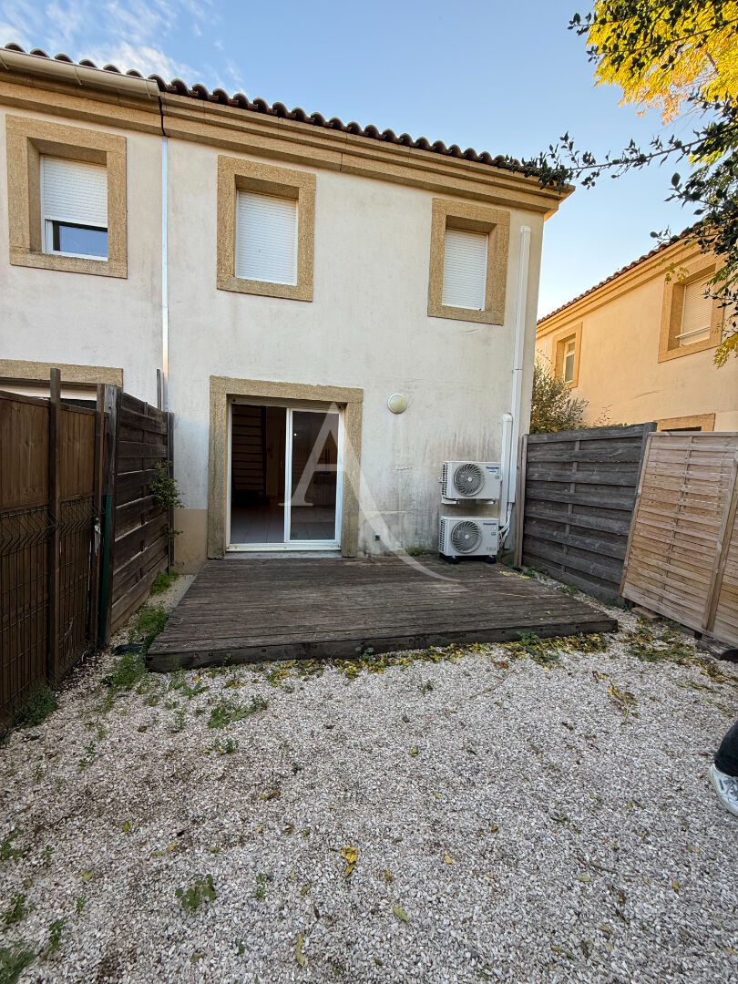 Photo MAISON 2 CHAMBRES AVEC GARAGE ET JARDIN A LEZIGNAN image 2/6