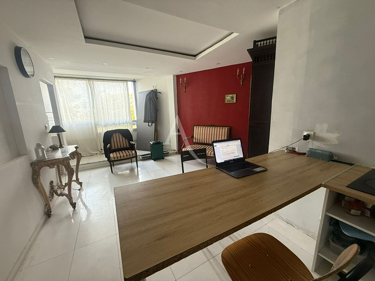 Appartement F2 une chambre, cave + place de parking en sous sol