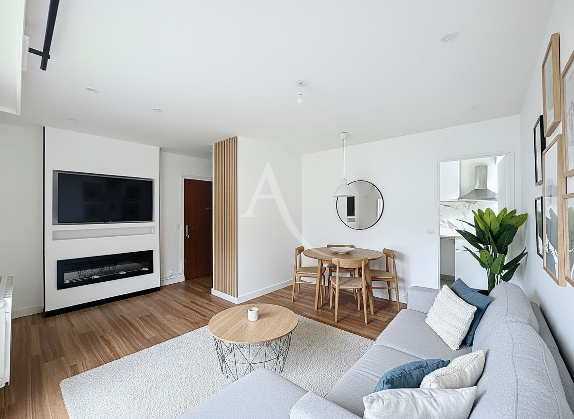 Photo Coup de coeur ! Idéal premier achat ou investissement locatif ! Studio proche gare avec place de stationnement et cellier. image 1/6