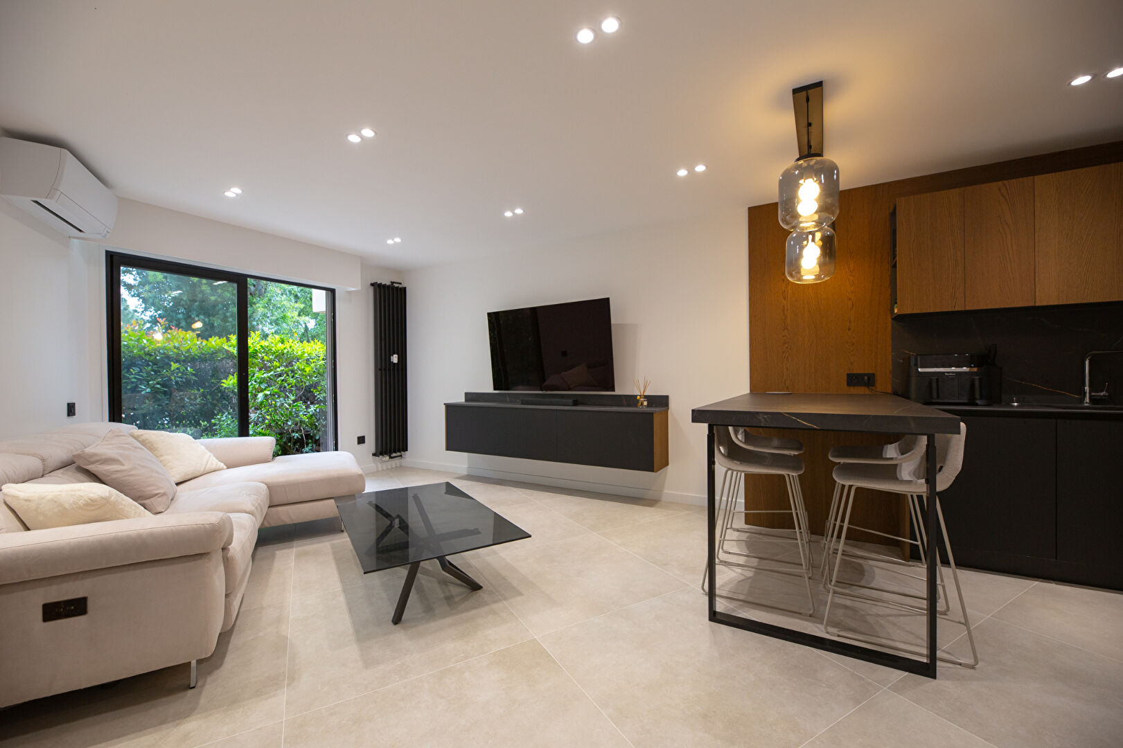 Appartement 2 pièce(s) d'exception en rez de jardin