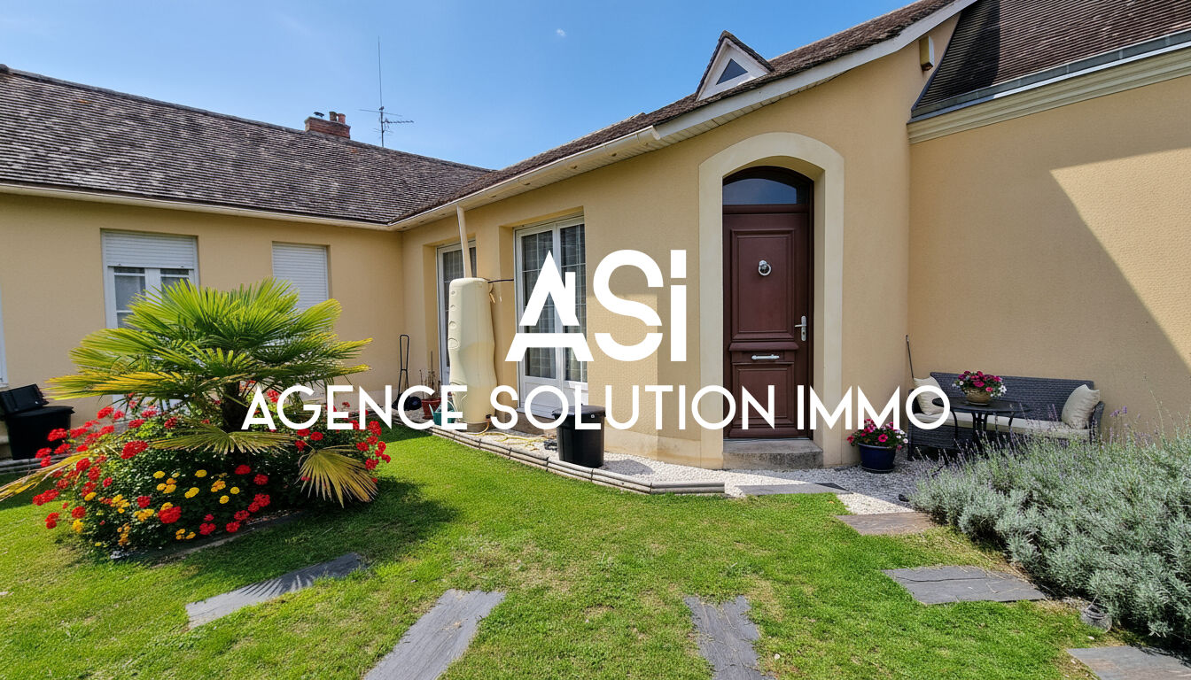 MAISON DE VILLAGE AVEC GARAGE ET JARDIN