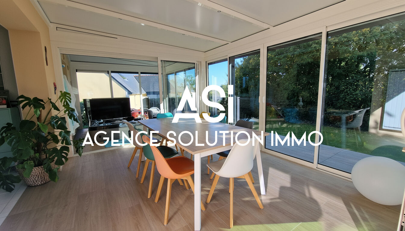 MAISON DE PLAIN PIED AVEC DEUX GARAGES