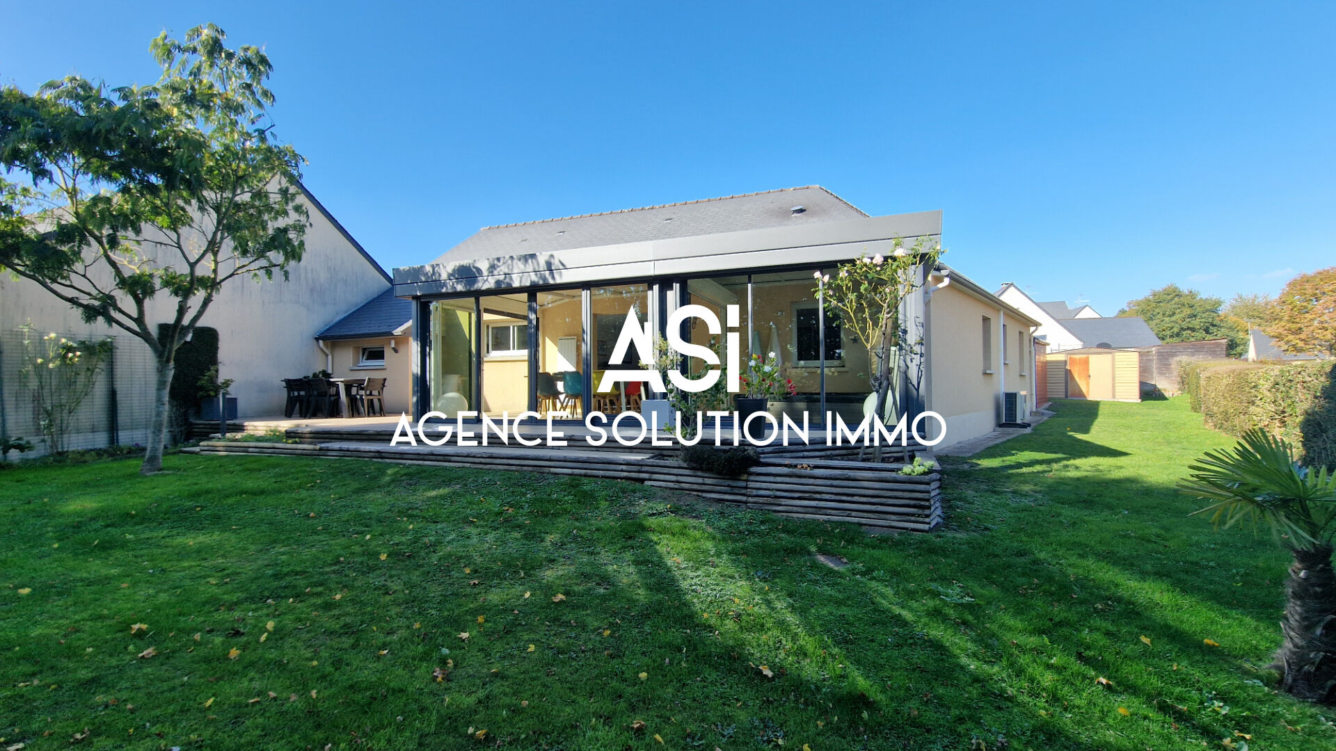 MAISON DE PLAIN PIED AVEC DEUX GARAGES