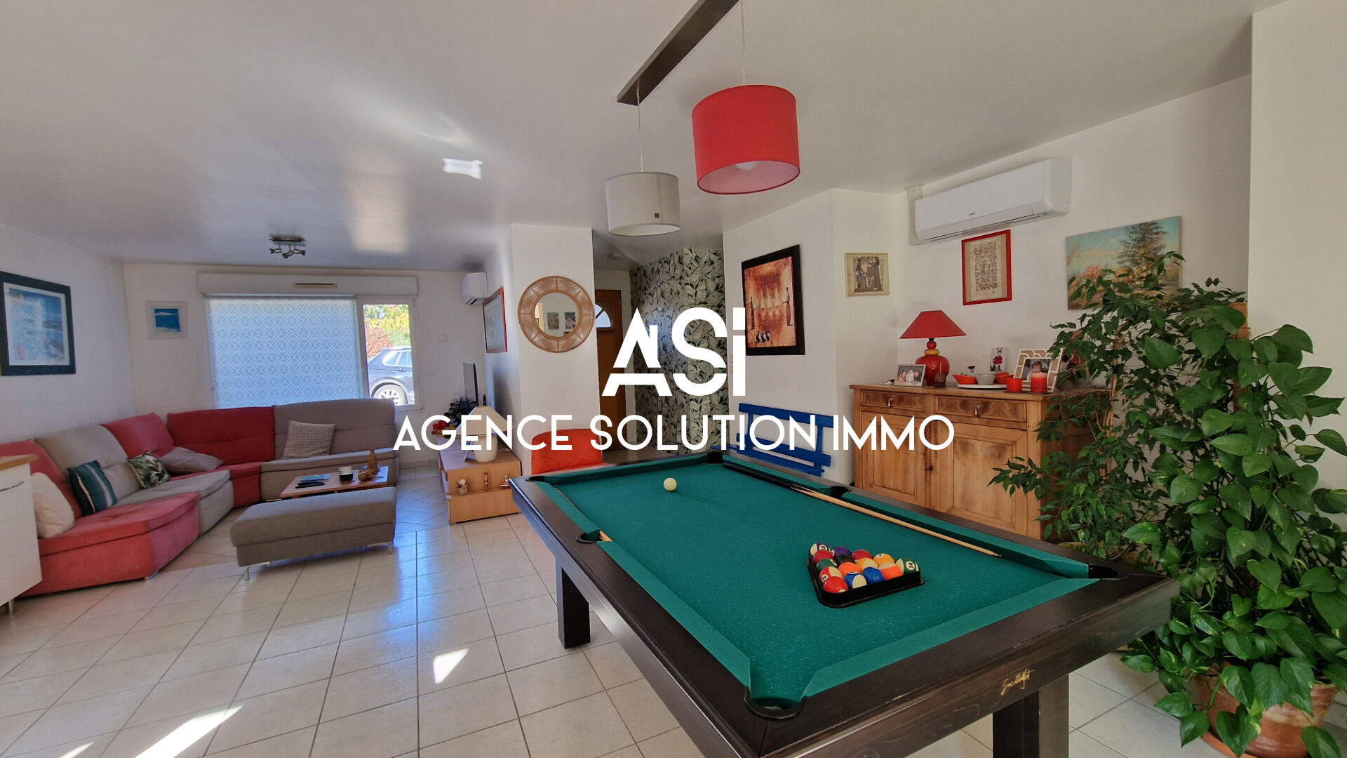 MAISON DE PLAIN PIED AVEC DEUX GARAGES