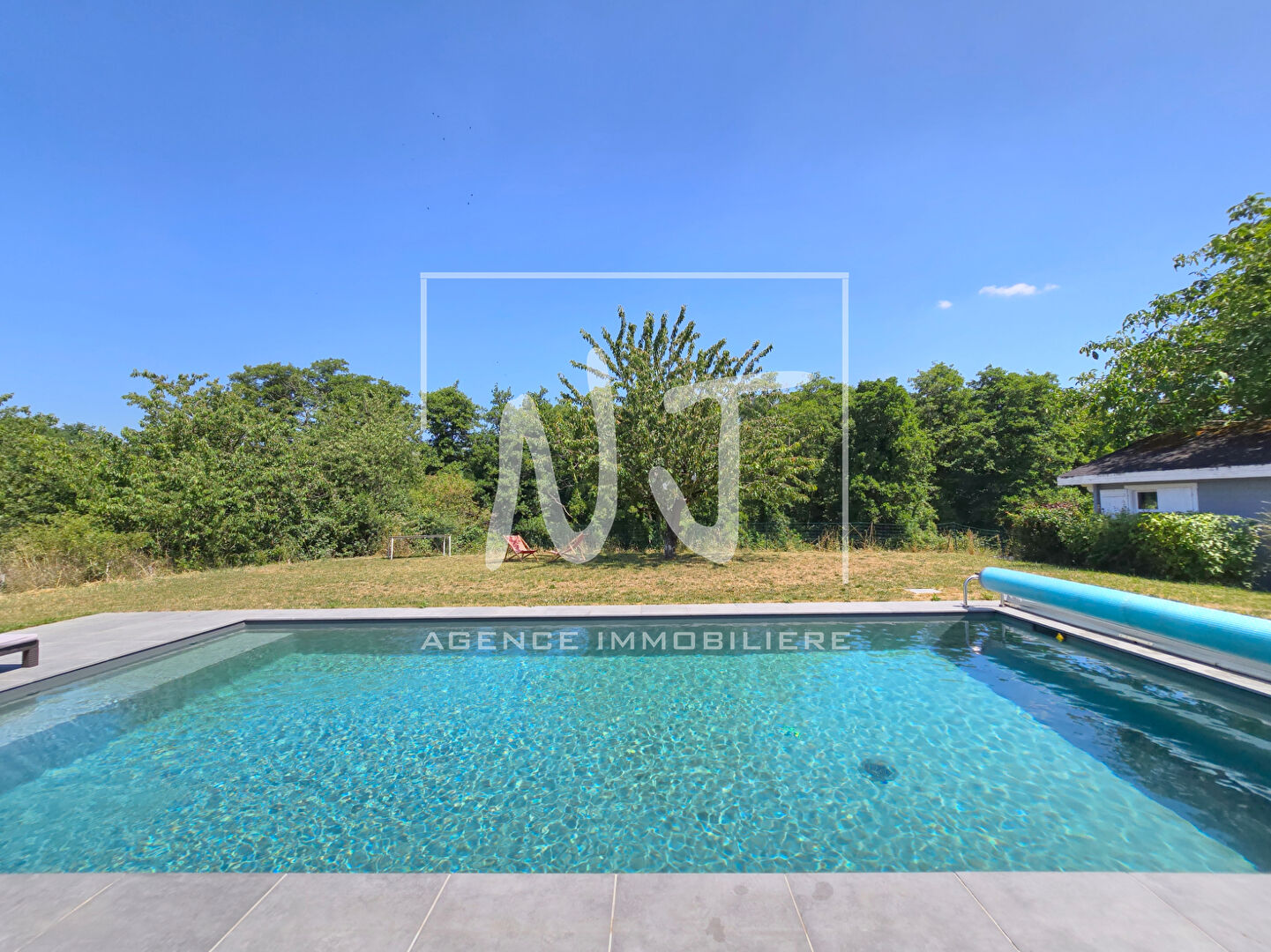 Maison 5 chambres avec piscine chauffée et garage