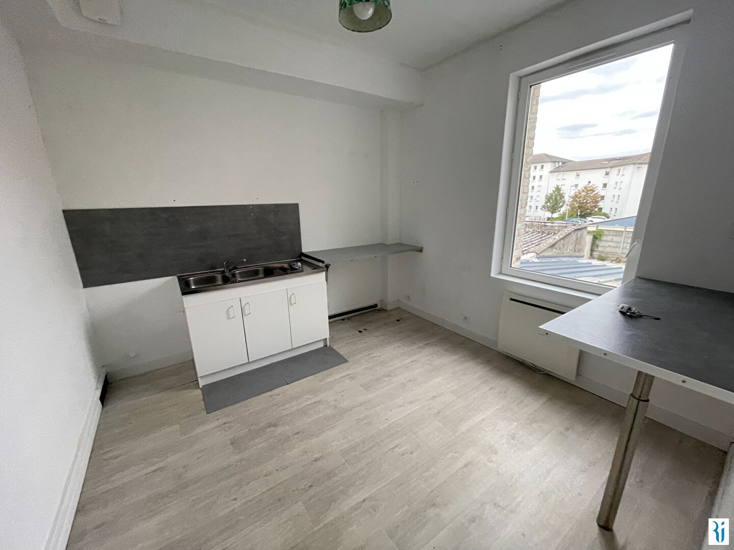 Photo LE PETIT-QUEVILLY - Charmante maison divisée en deux appartements image 3/6