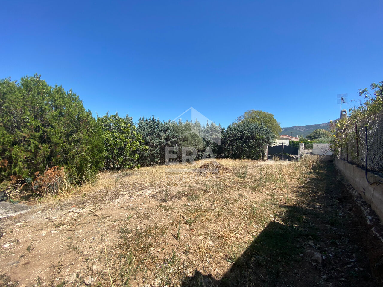 Photo A VENDRE 13530 TRETS TERRAIN CONSTRUCTIBLE DE 325M² PROXIMITE DU CENTRE VILLE image 2/4