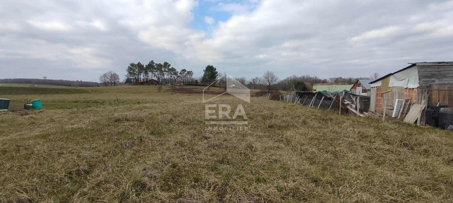 Photo Terrain constructible de 3607 m² image 1/3