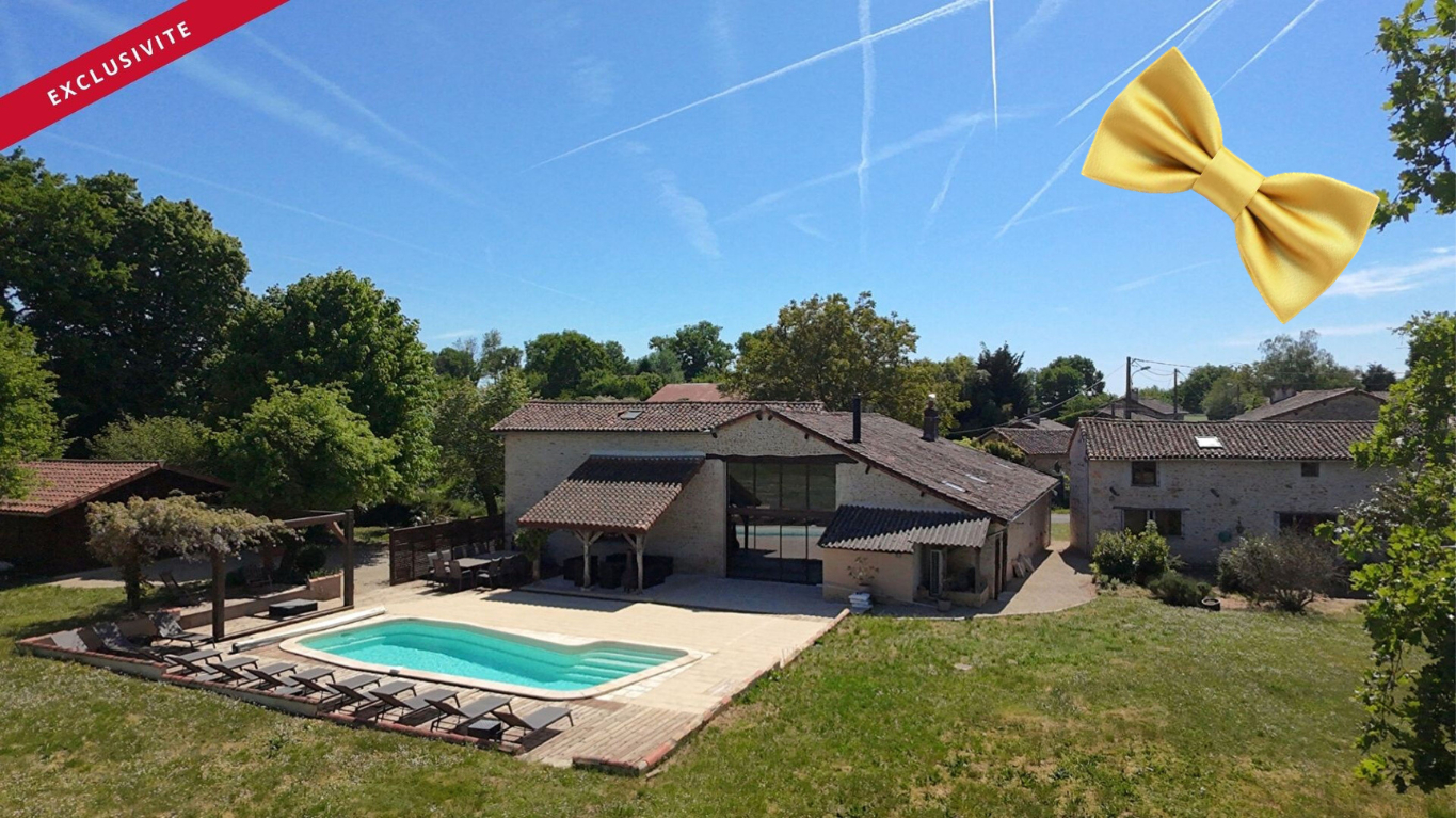 Maison d'Exception à Vendre à Champniers - 295 m² sur Terrain de 4700 m² avec Piscine