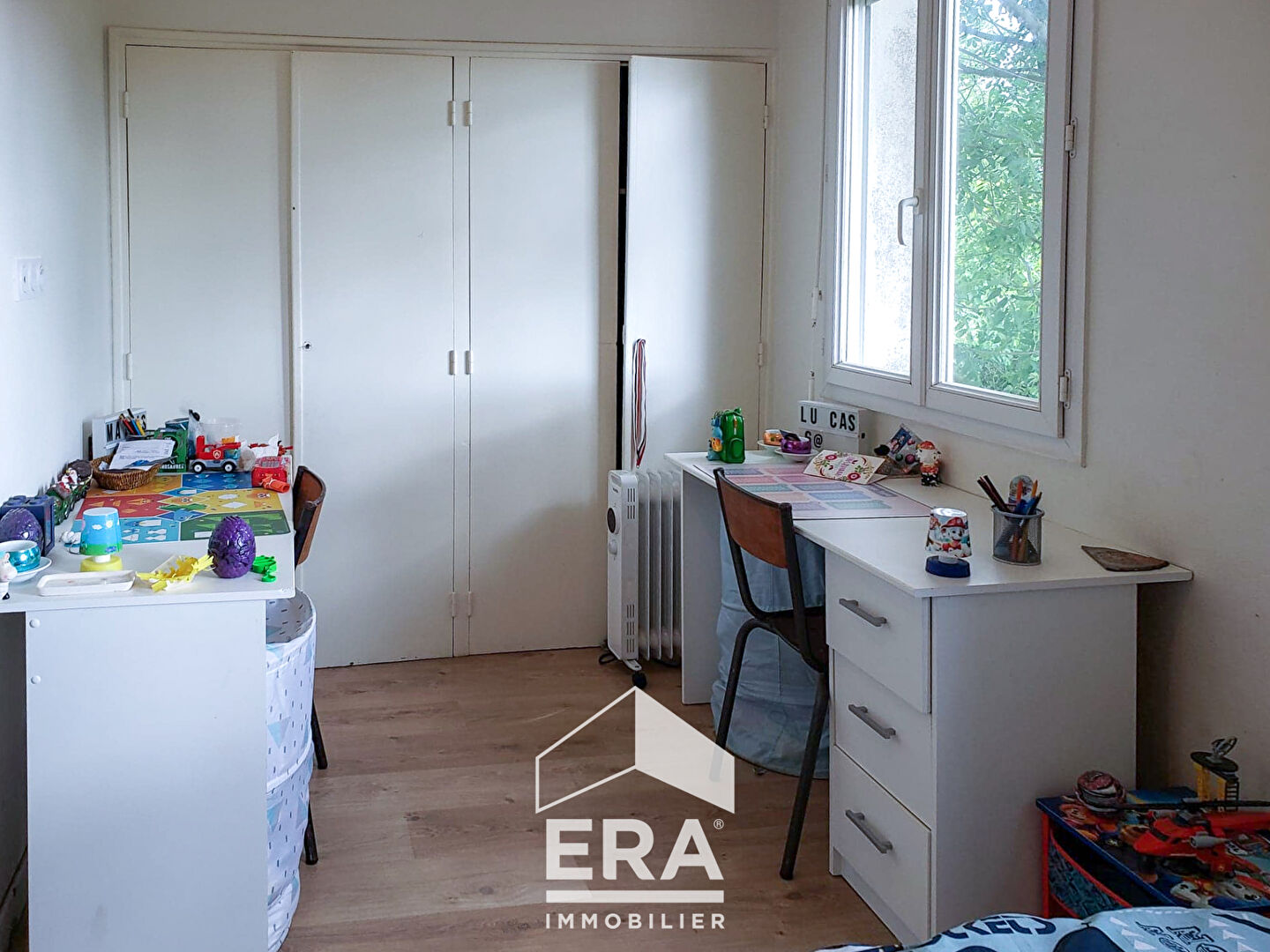 Photo Maison avec garage beau jardin image 3/4