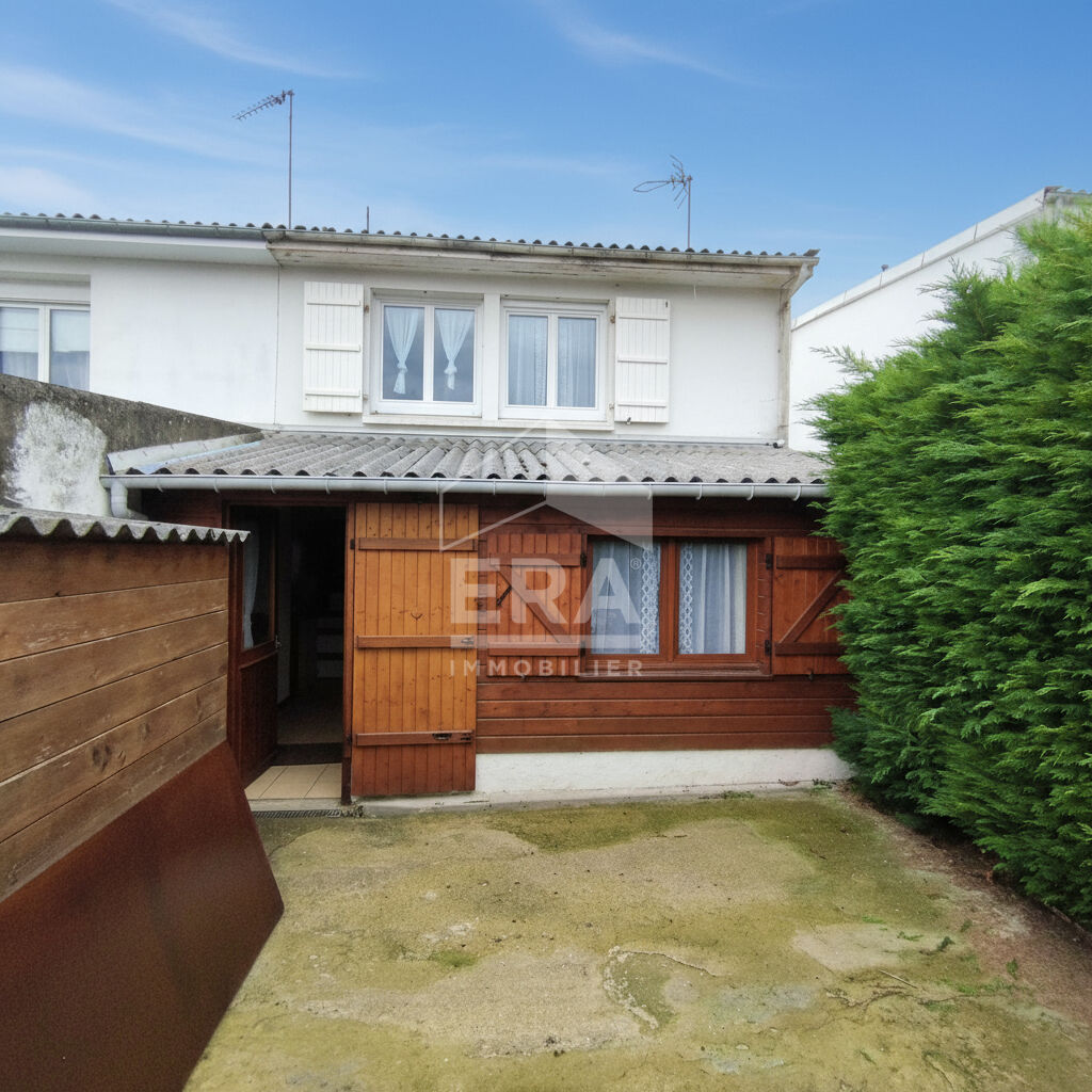Photo Maison de ville avec jardin - 2 chambres à rafraîchir image 1/6