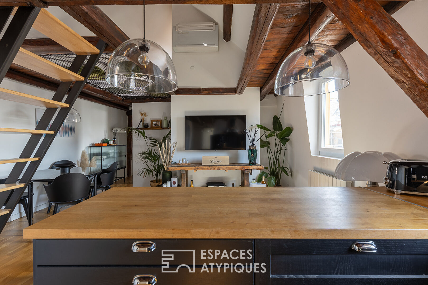 Duplex en dernier étage en coeur de ville