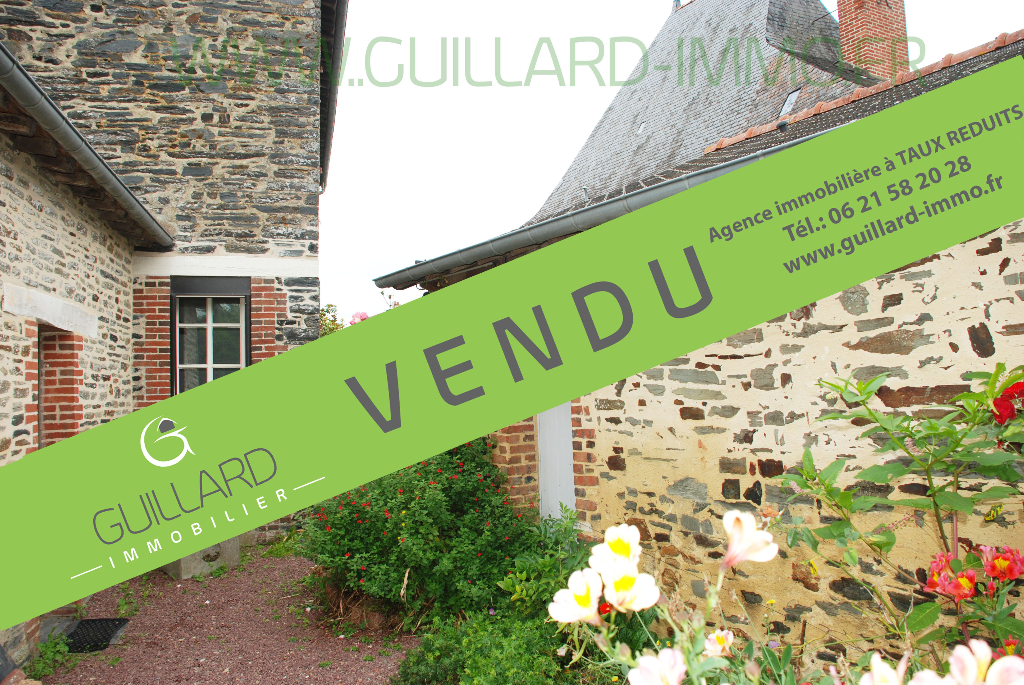 Photo Maison de bourg  à Amanlis - 3 chambres, un bureau. Dépendances image 1/4