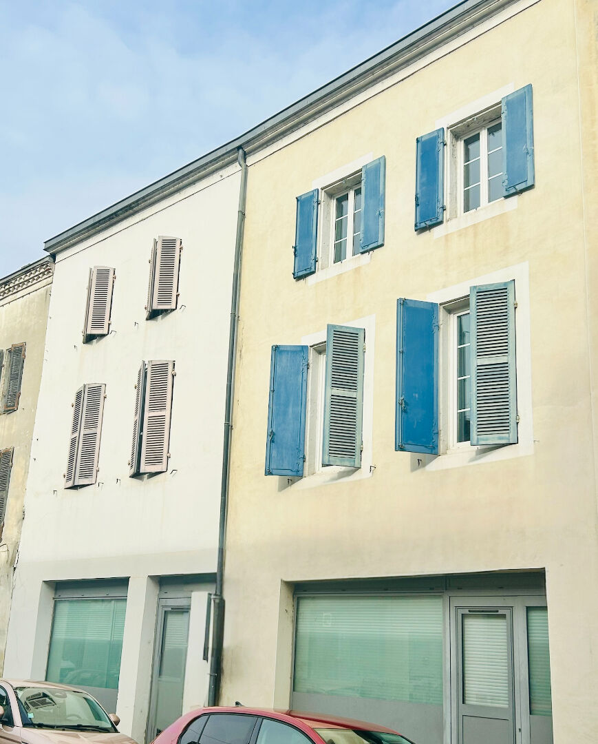 Photo Immeuble de 9 appartements entièrement loué image 1/6