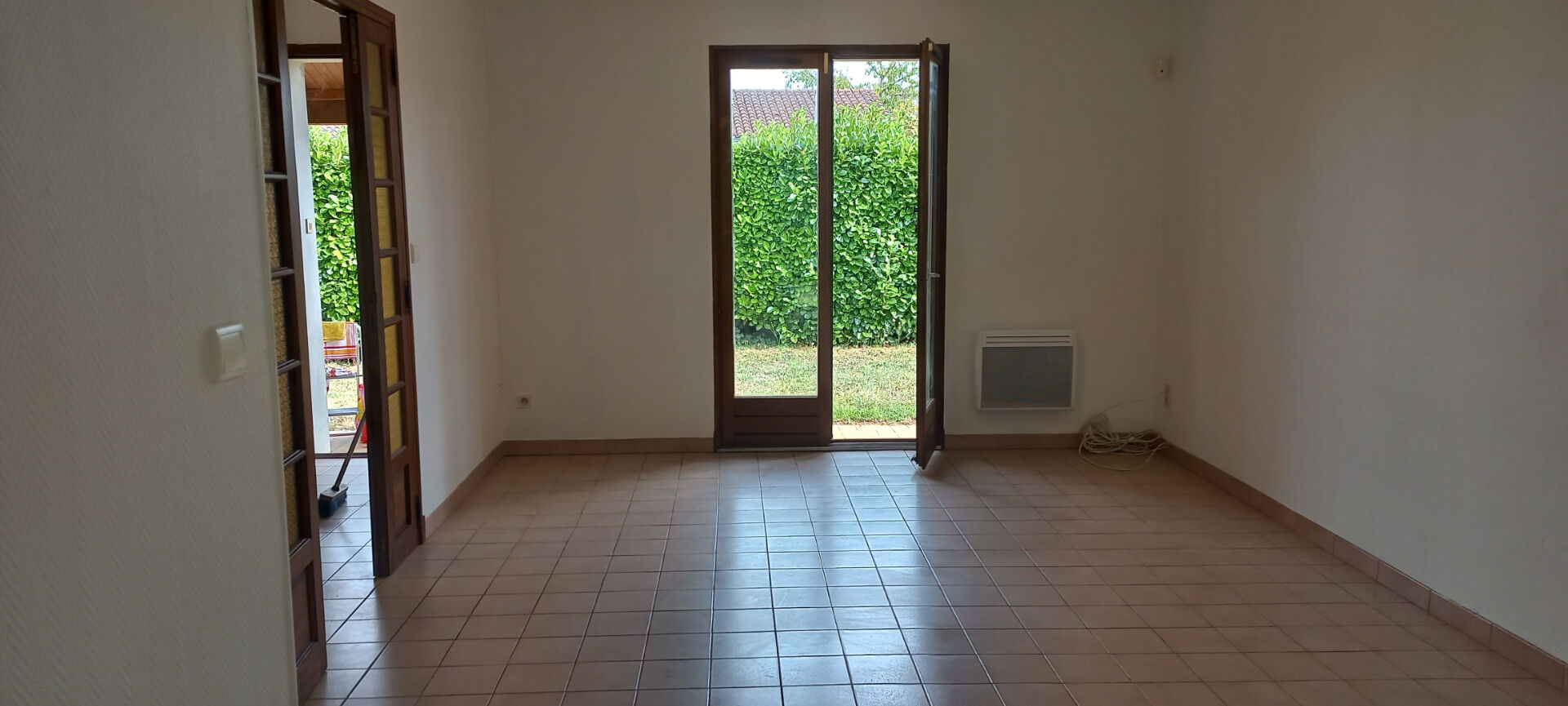 Photo Maison T4 de 80 m² de plain pied avec jardin et garage image 3/6
