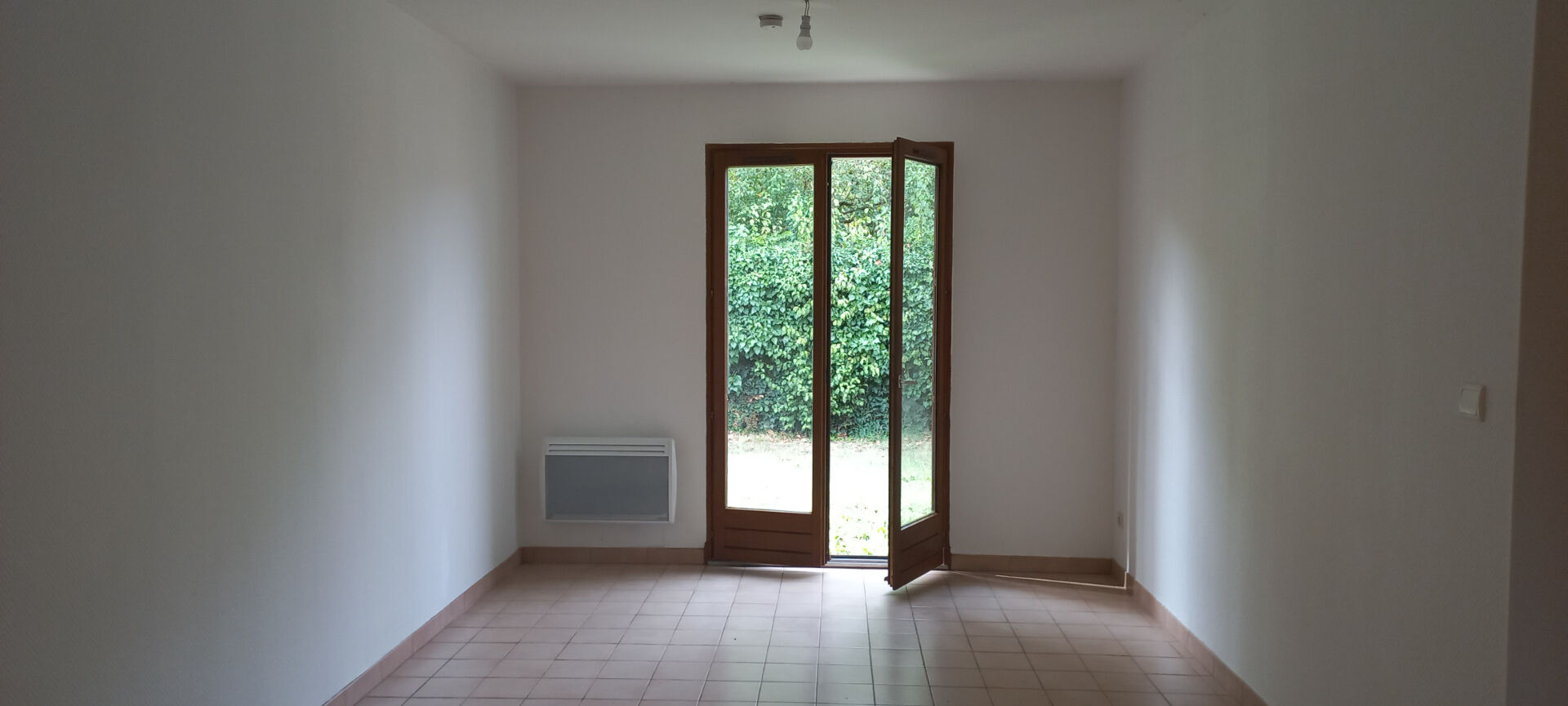 Photo Maison T4 de 80 m² de plain pied avec jardin et garage image 6/6