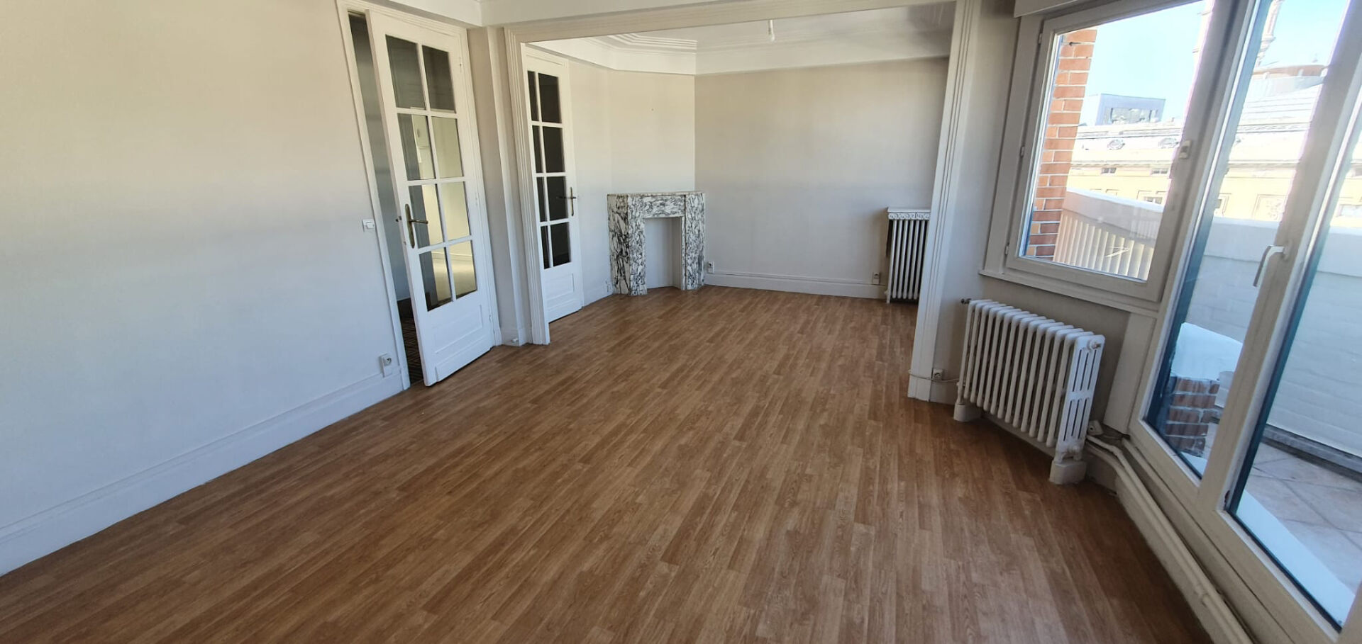 Photo Rue Anatole France -Appartement 76.24m² - double balcon image 2/5