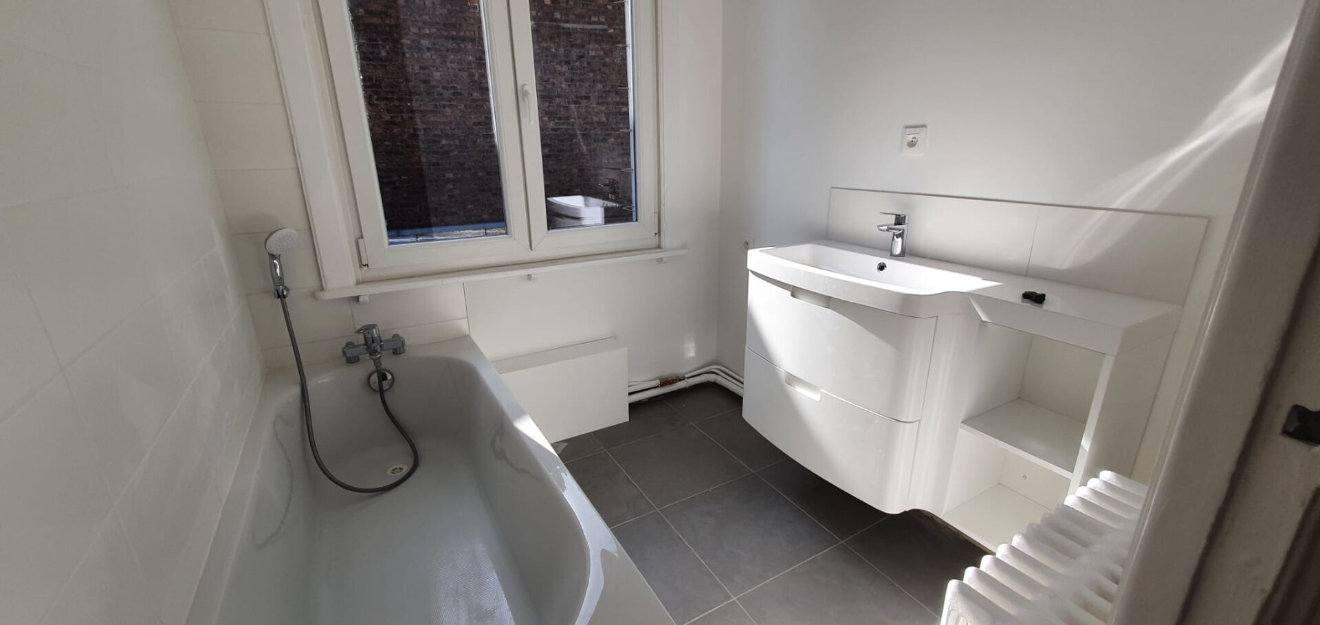 Photo Rue Anatole France -Appartement 76.24m² - double balcon image 5/5