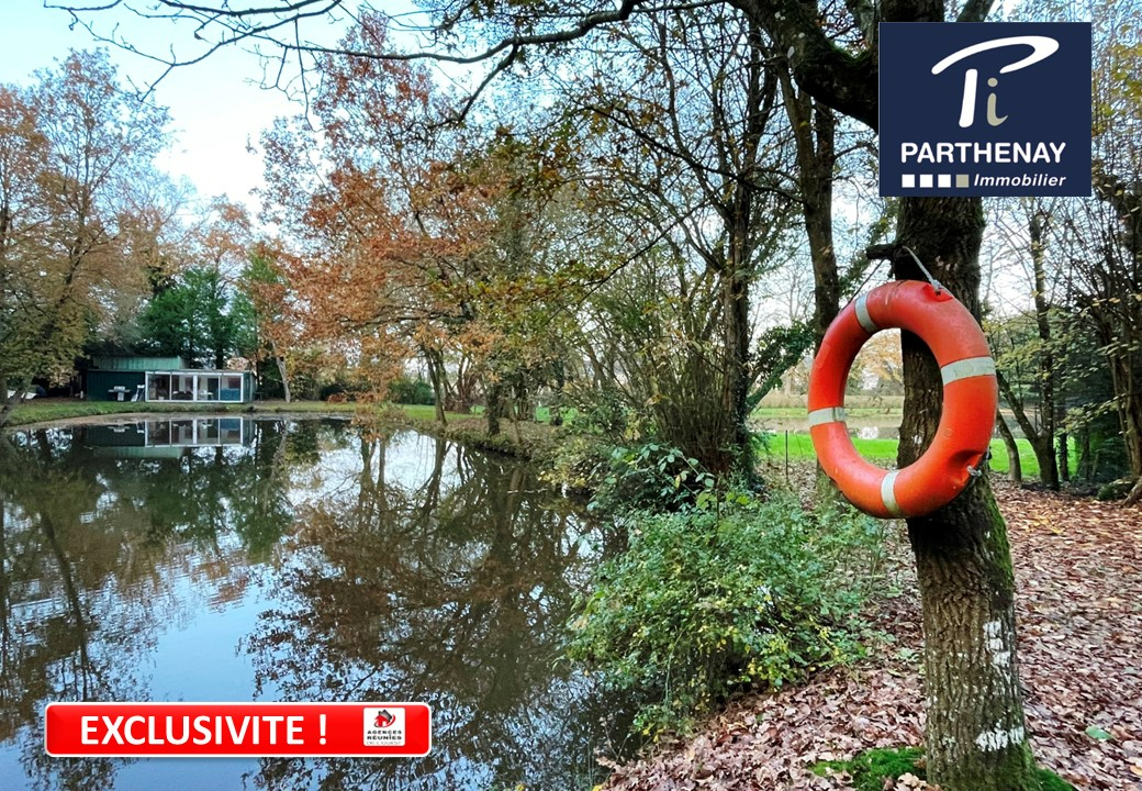 Photo Terrain de loisir avec 2 étangs 8950 m2 image 2/6