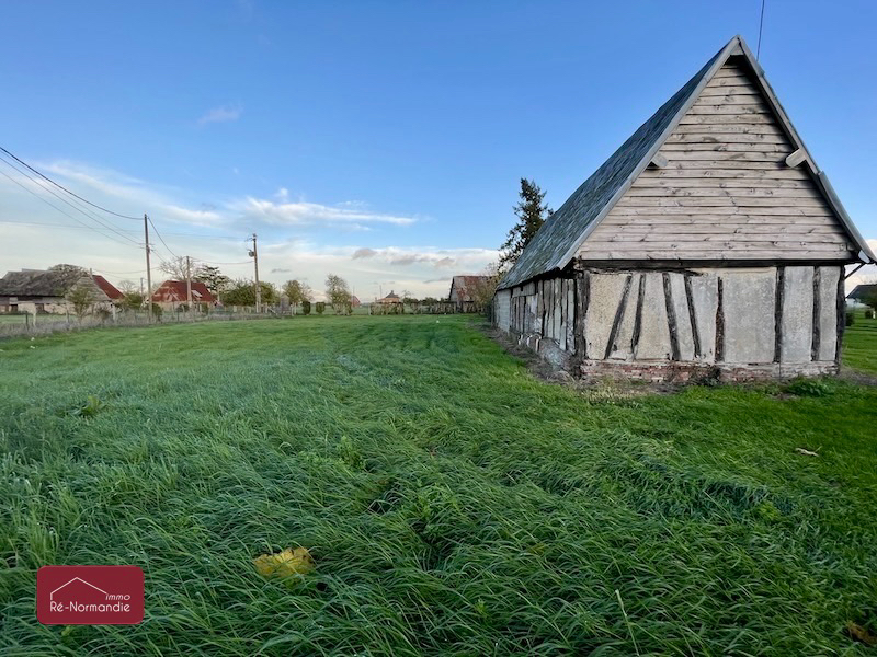 Photo TERRAIN CONSTRUCTIBLE D'ENVIRON 1000m² AVEC BATIMENT image 3/6