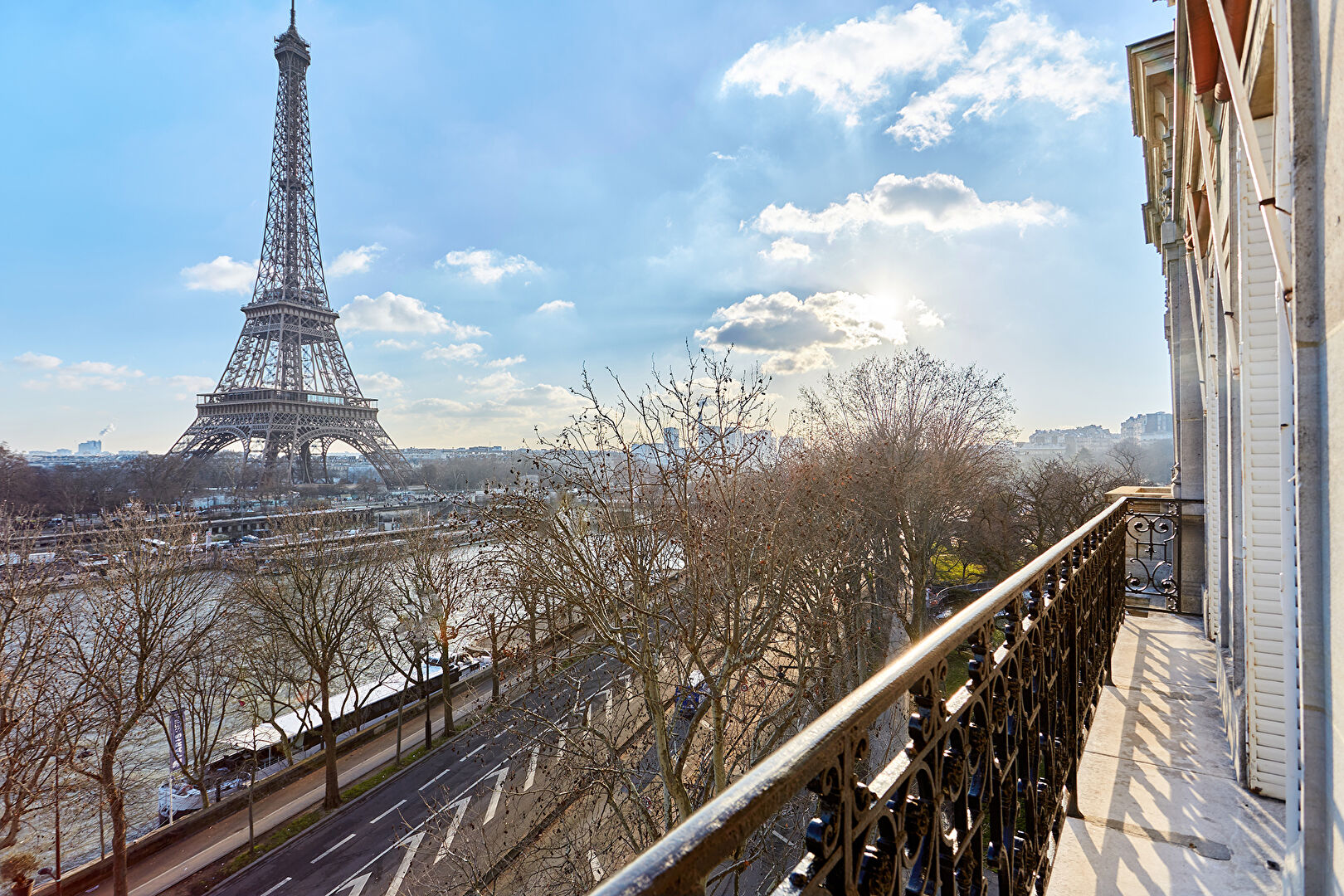 Three-bedroom property with a balcony view of the Eiffel Tower, located in Paris, Île-de-France, 75016.