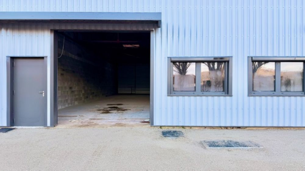 Entrepôt / local industriel Saint Etienne De Crossey 230 m2